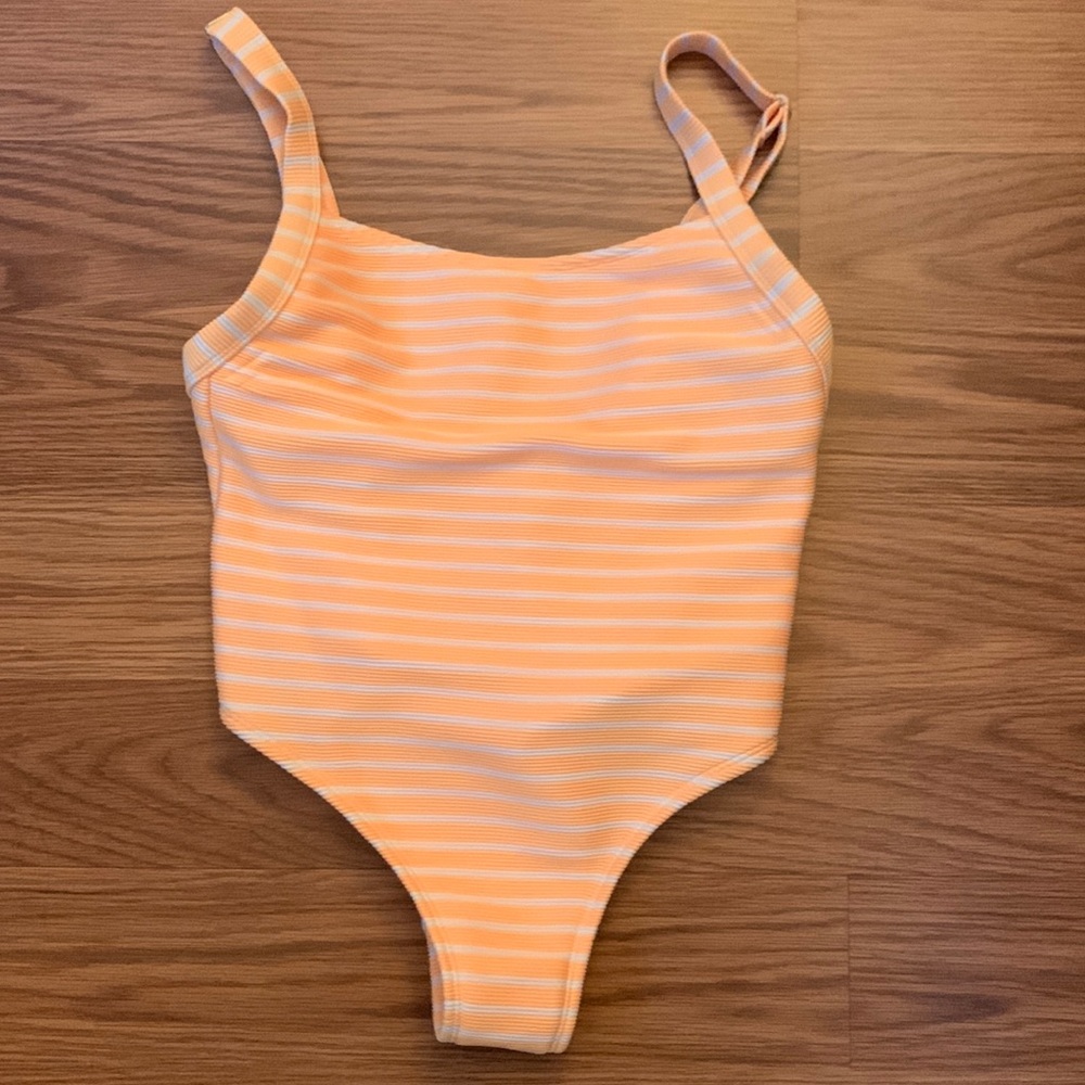 Orange and white striped one piece swimsuit